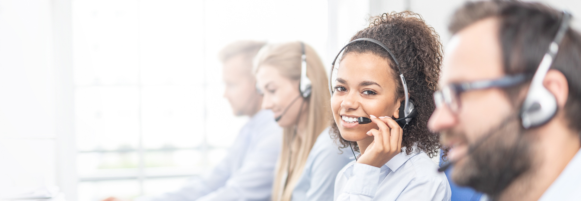 Call Center Worker Accompanied by Her Team